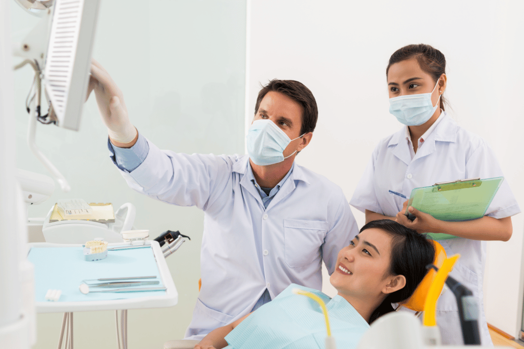 Orthodontist explaining aligner cleaning routine